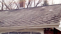 photograph of a damaged roof